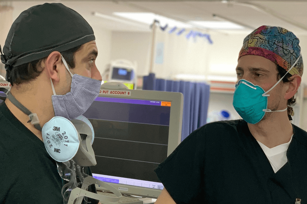 Two doctors speaking at hospital